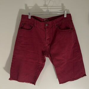 Men cut off denim shorts, size 33 waist, color burgundy. Gently worn.